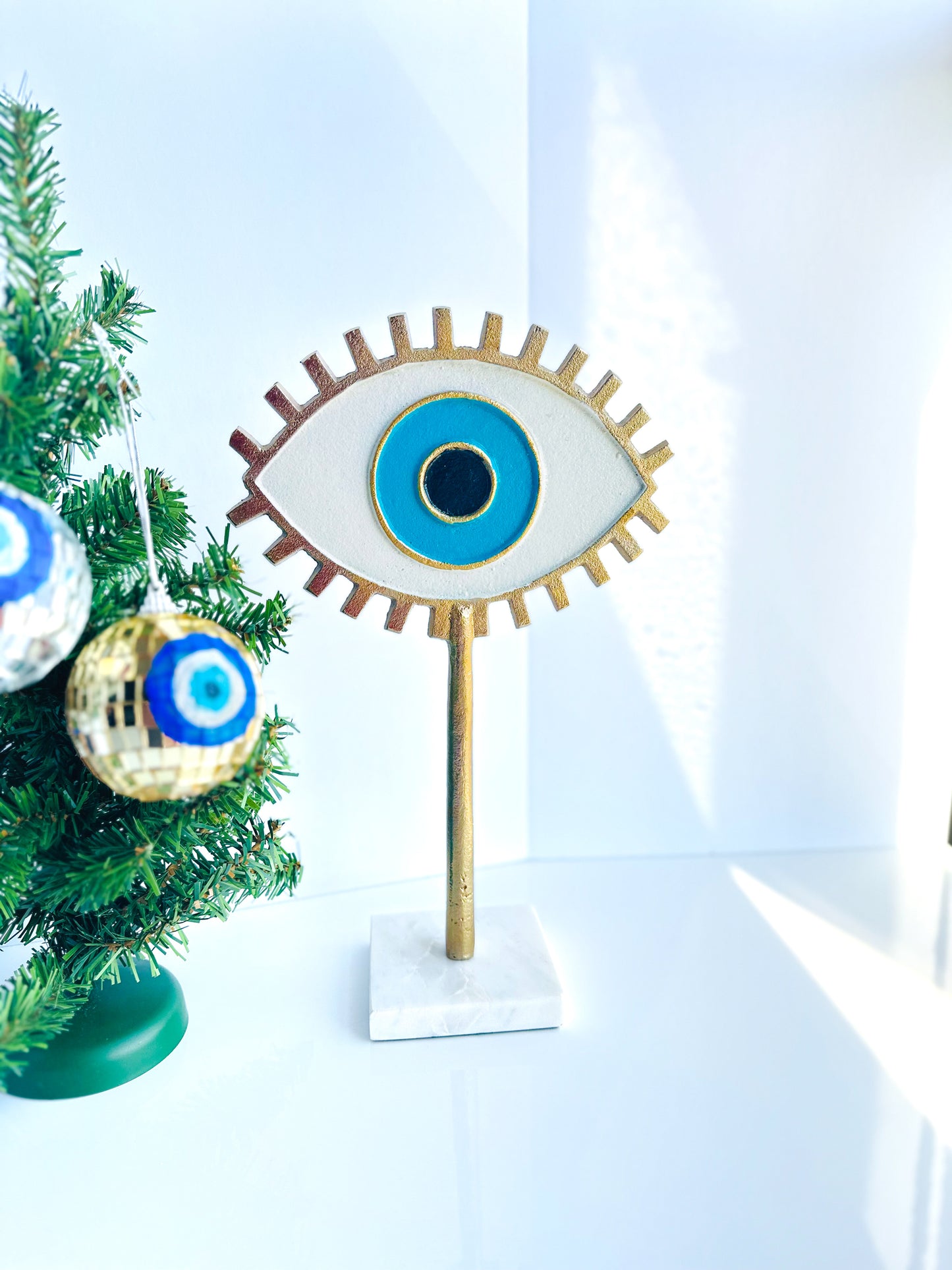 Evil Eye Gold Sculpture